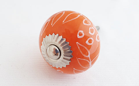 Ceramic orange delicate white floral design 4cm door knob d5a